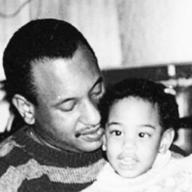 Black and white photo of Robin and dad.